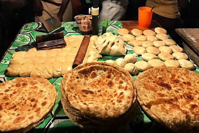Nighttime Boda Boda Street Food Tour - Meeting at Uganda Post Office and What Your Evening Setup Looks Like